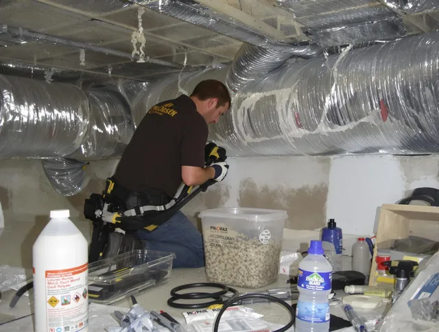 Northbridge Air Duct Cleaning specialist performing professional mold removal from air ducts in Northbridge